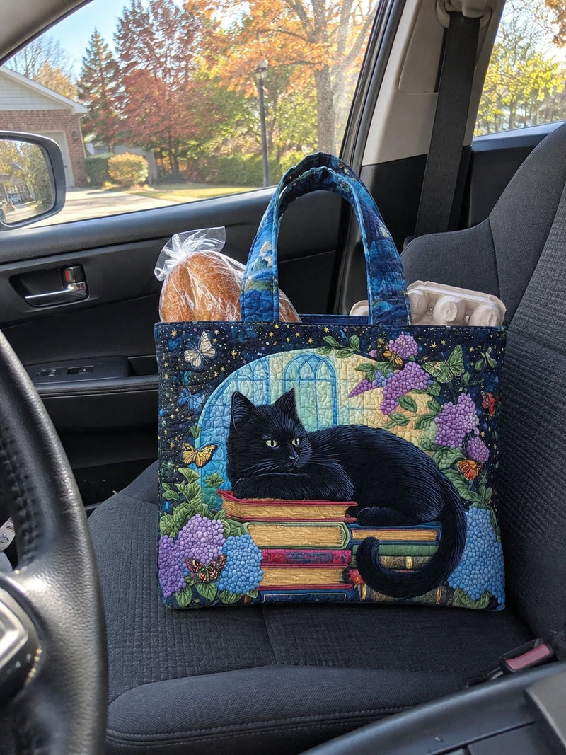 Gesteppte Tasche Schwarze Katze auf Büchern