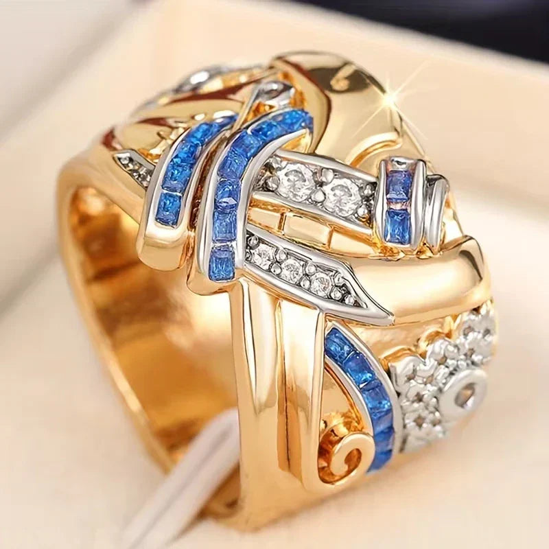 Selene | Luxe Mittlerer Osten KC Breite Blumenring mit blauem Zirkonia-Einsatz