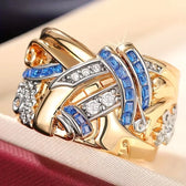 Selene | Luxe Mittlerer Osten KC Breite Blumenring mit blauem Zirkonia-Einsatz